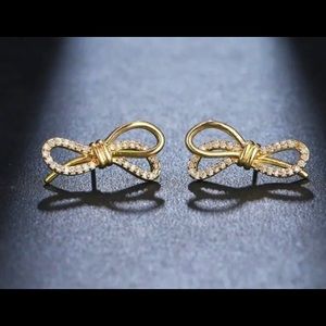 Gorgeous gold plated bow earrings with Swarovski elements